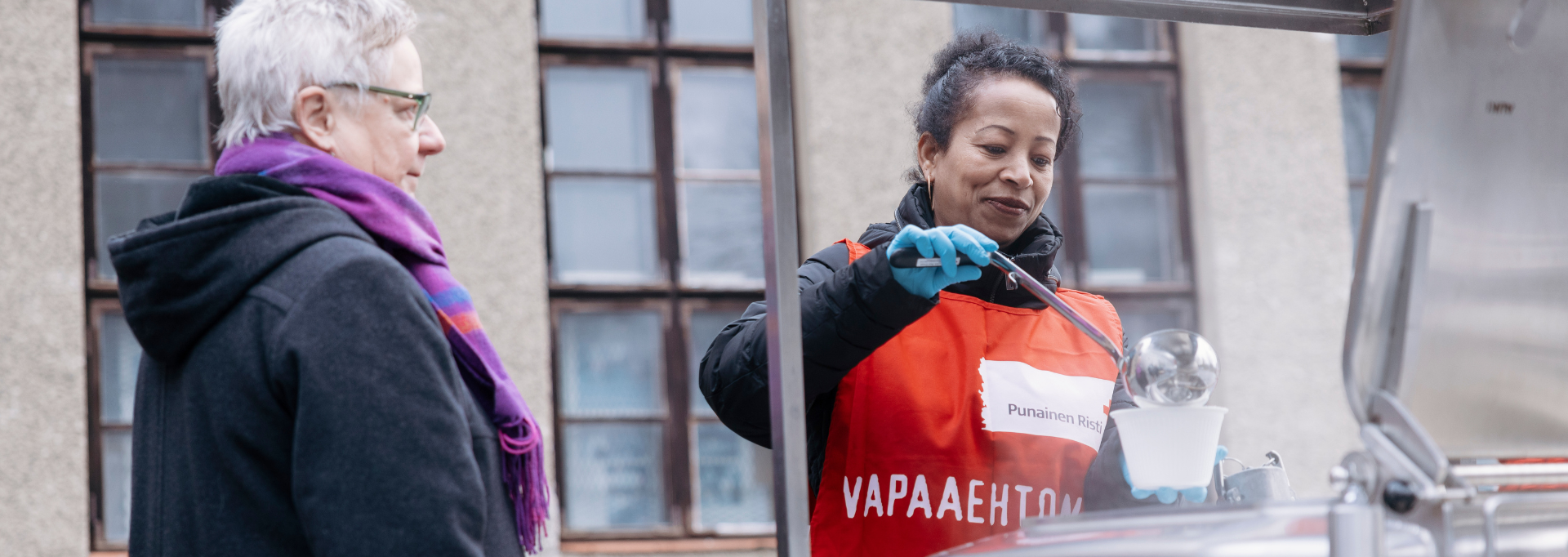 Children playing superheroes at a refugee camp.