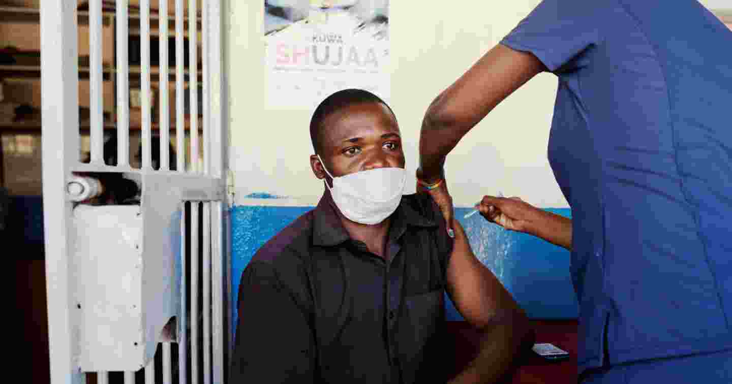 A man receiving a vaccine.