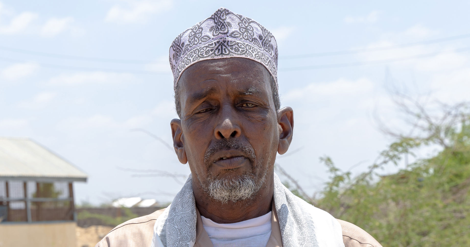 Aden Sugow looks at the camera in the sunshine in Turkana.